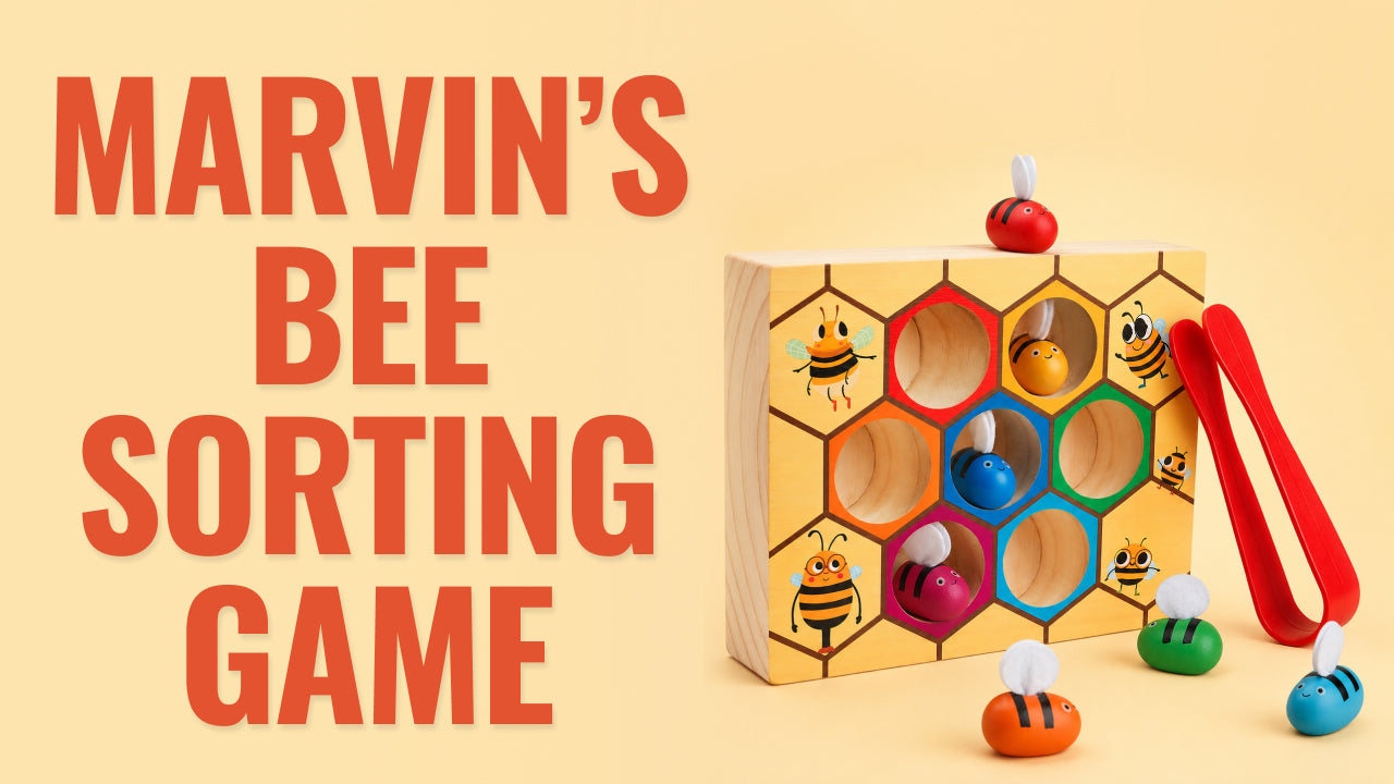 Load video: Video review of Marvin’s Bee Sorting Game - a colorful wooden matching toy that helps kids build fine motor skills, coordination, and color recognition through fun hands-on play.