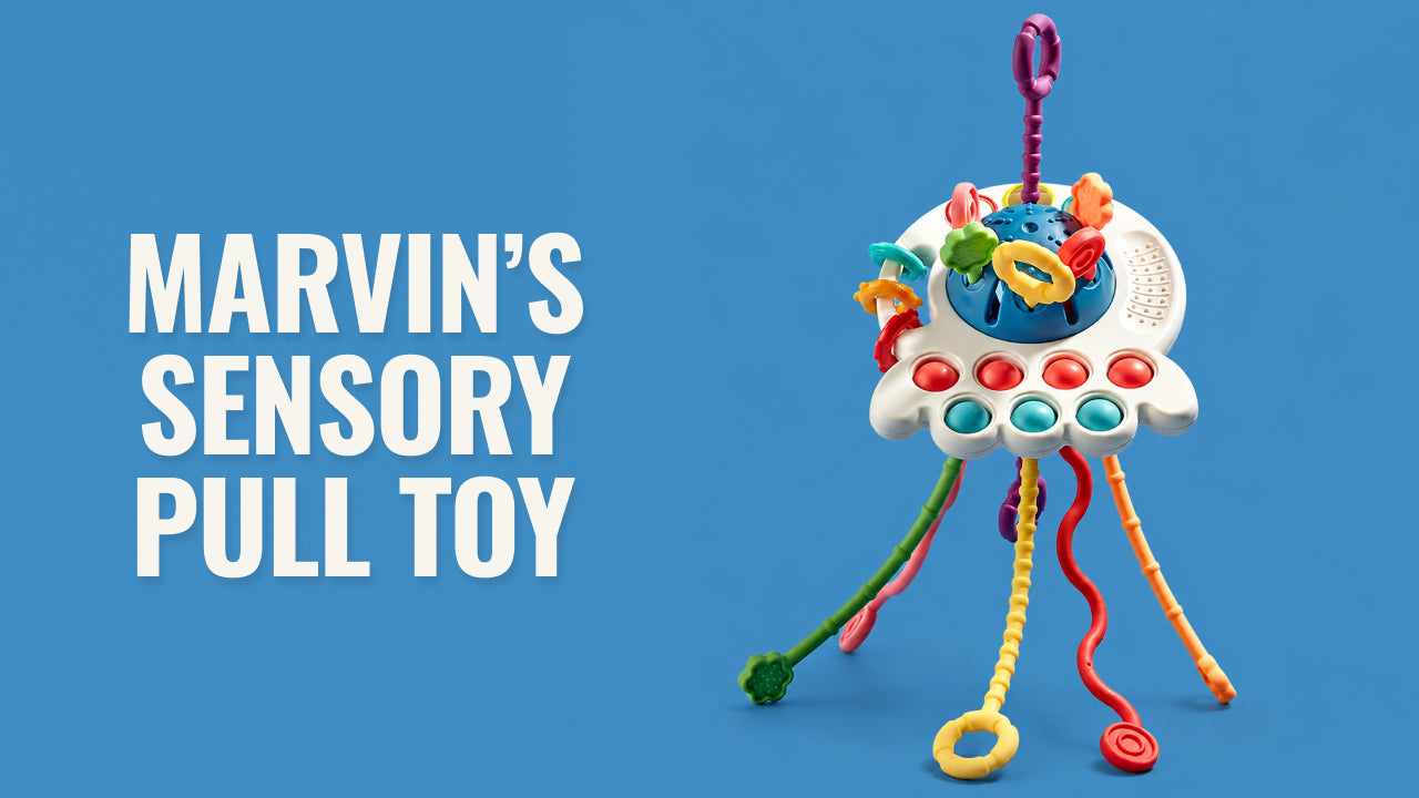 Load video: Video review of Marvin’s Sensory Pull Toy — a colorful baby sensory toy with pull strings, pop-it elements, and textured surfaces that encourage fine motor development and hands-on exploration.