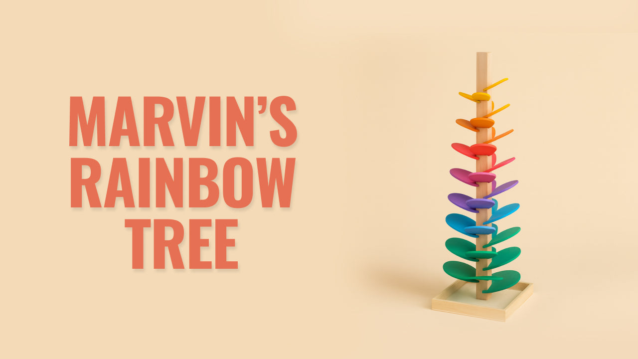 Load video: Video review of Marvin’s Rainbow Tree – a Montessori-inspired wooden stacking toy that helps toddlers 2+ learn colors, balance, and coordination while boosting focus and creativity through hands-on play.